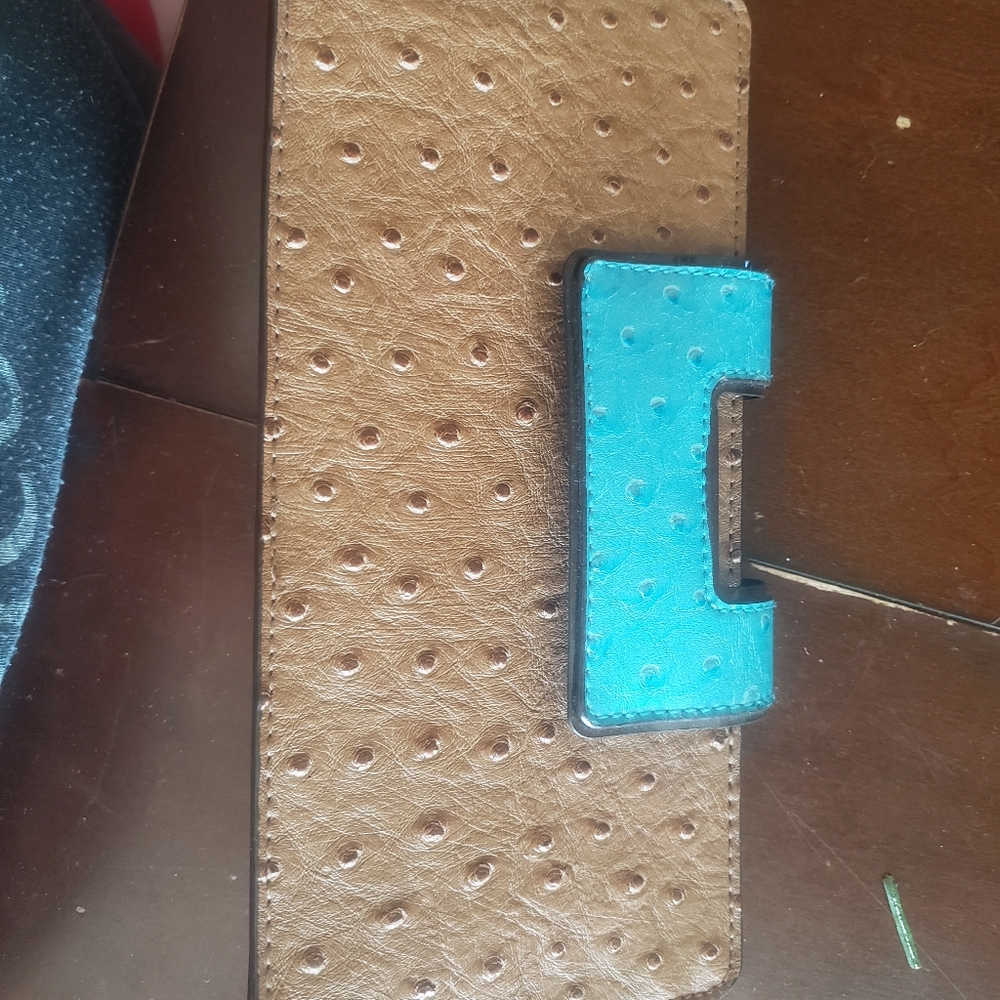 Brown leather clutch